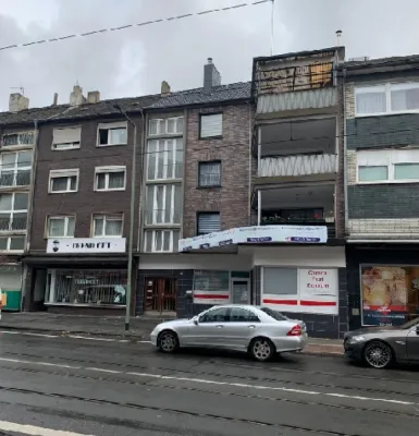 Mehrfamilienhaus mit 4 Wohnungen und Gewerbefläche zu verkaufen - Foto 1